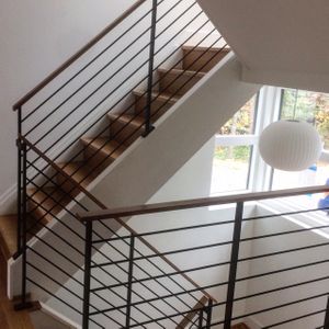 Interior steel rail with white oak cap